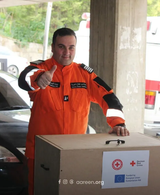 An Aareen responder takes part in a humanitarian aid delivery.
